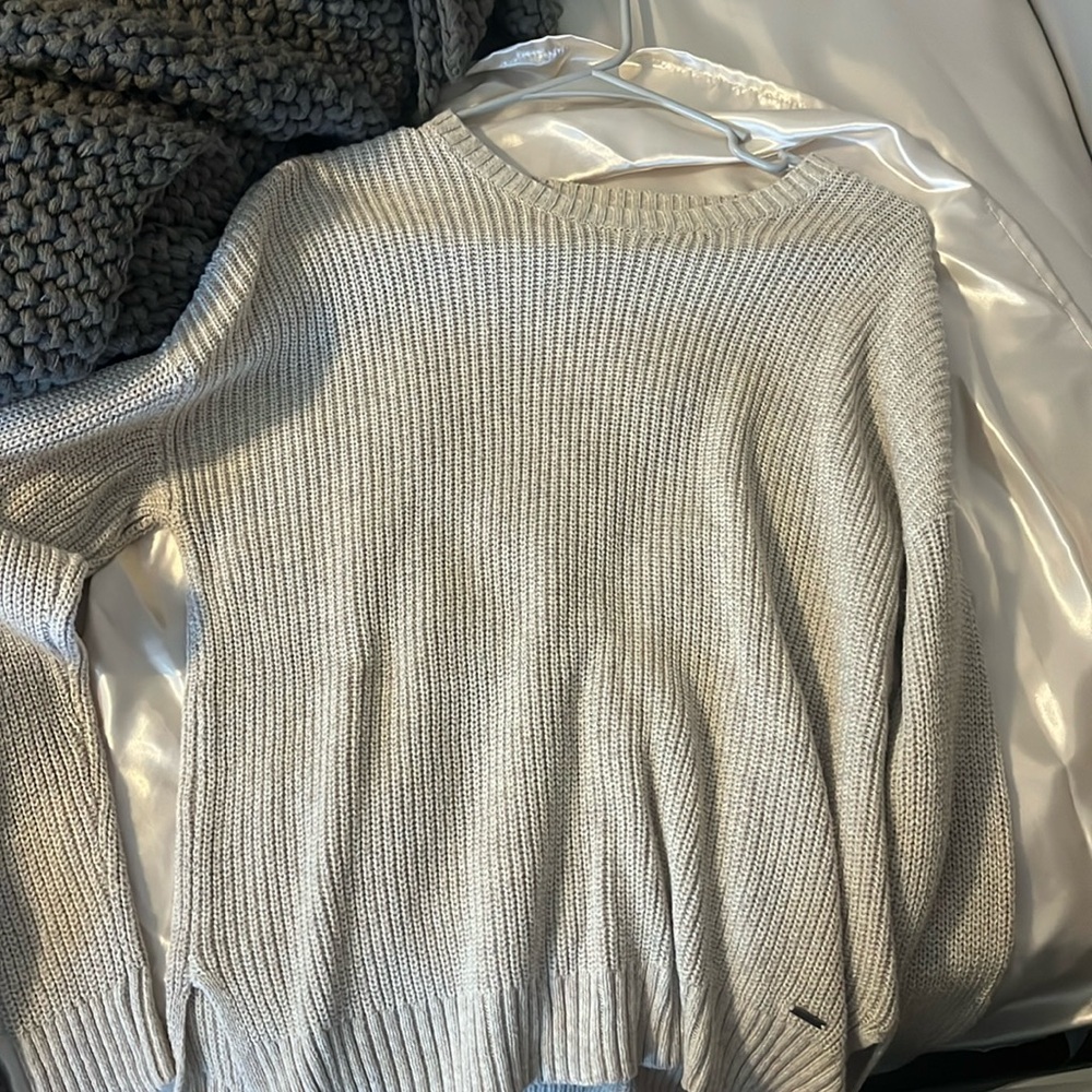 Tan hollister sweater.
